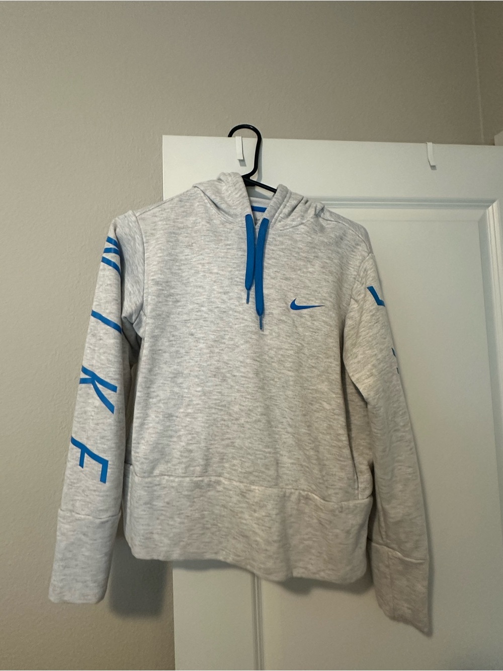 Nike Women’s Light Gray Crewneck Hoodie with Blue Accents